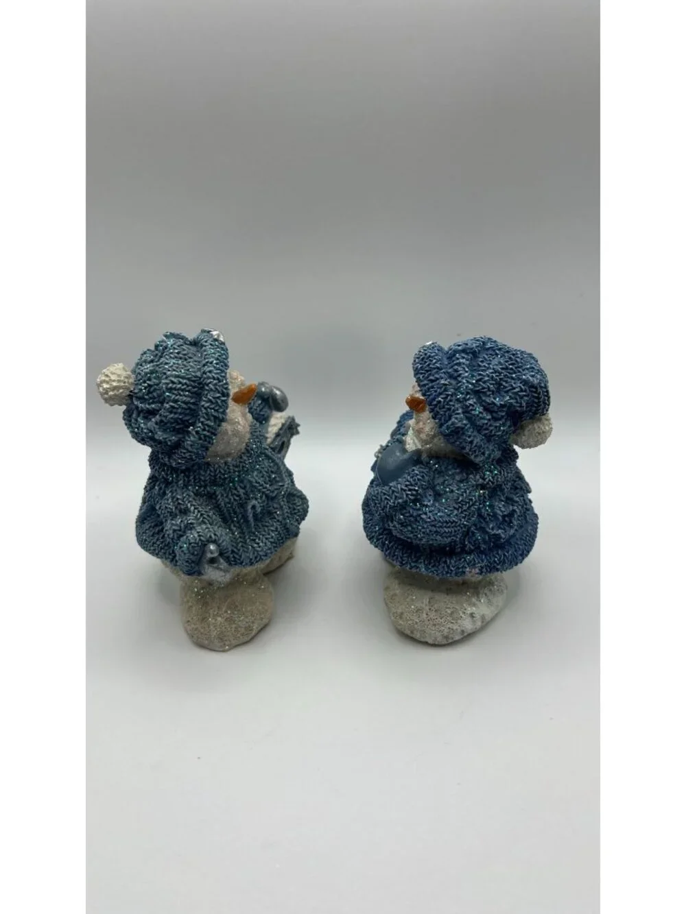Set Of 2 Glittered Blue Snowman Figurines With Knitted Look Holding Birdhouse &
